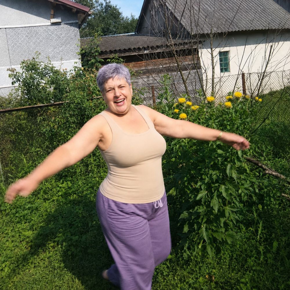 Out in the garden in the tank, arms wide